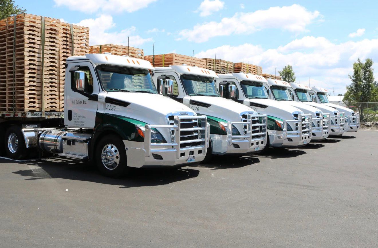 A-1 fleet trucks loaded with pallets